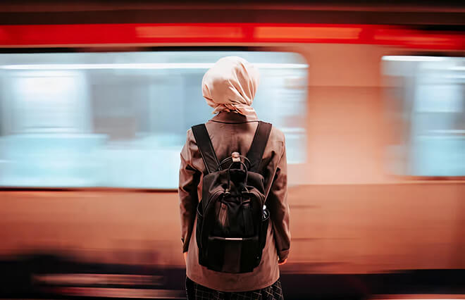 Person with a backpack in motion, representing BigCommerce’s innovative e-commerce technology solutions.