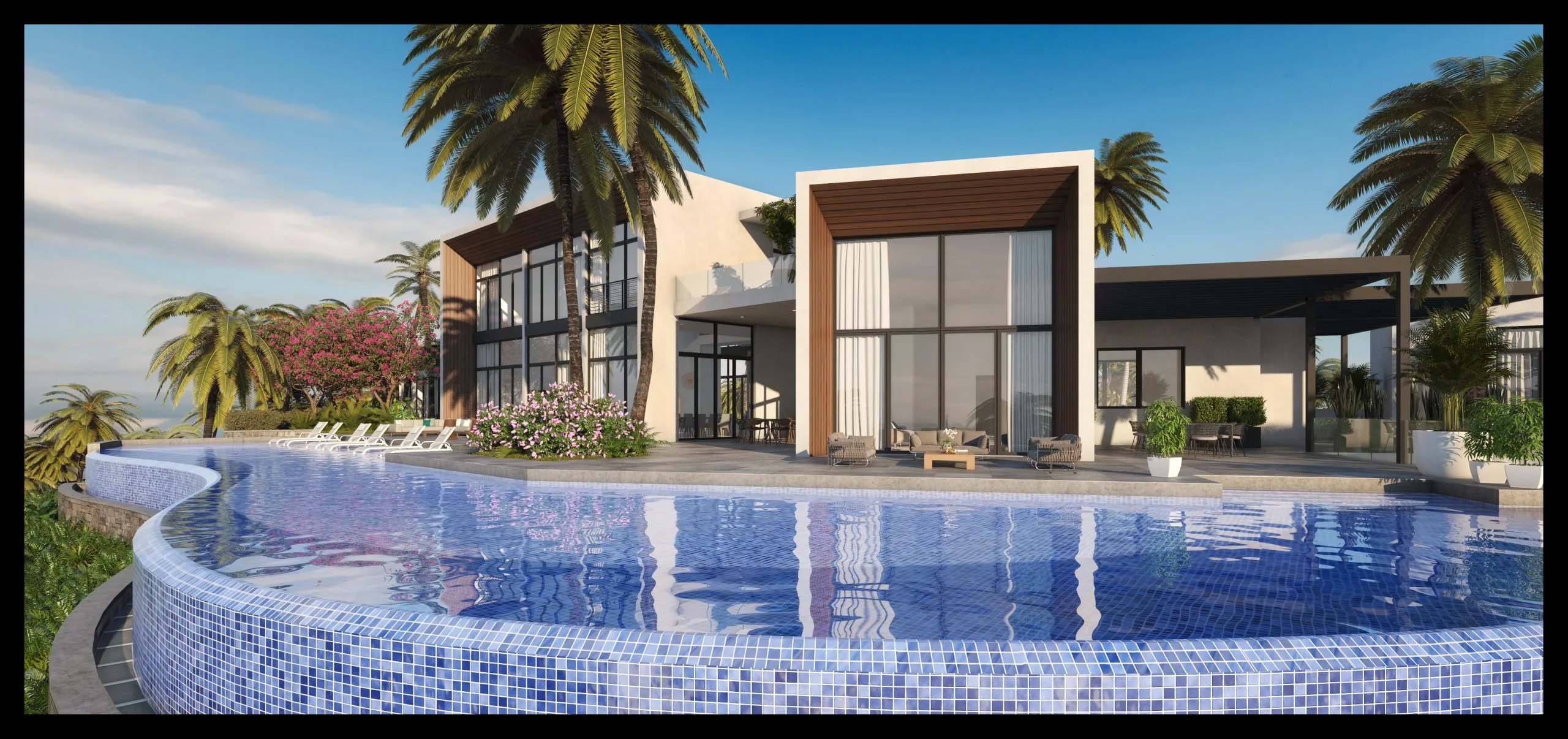 Close-up of curved mosaic infinity pool with outdoor lounge and wood pergola, St. Lucia