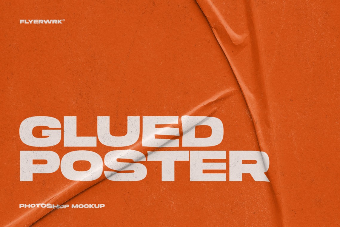 Glued A2 Poster Mockup close up on an orange paper surface highlighting authentic folds and paper grain