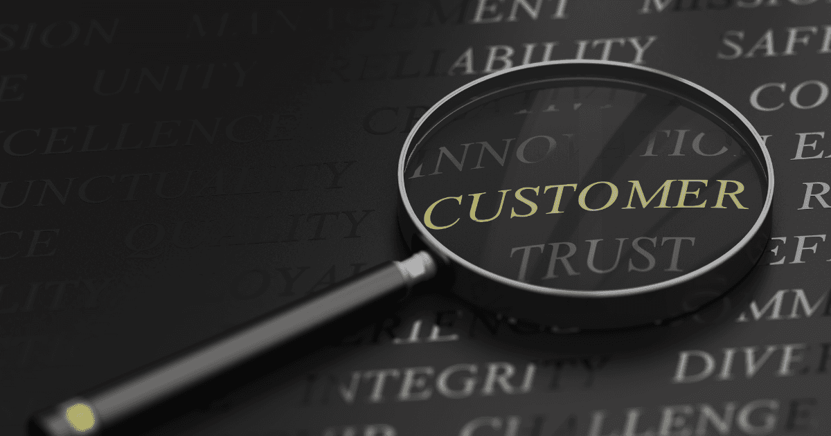 Suurennuslasi suurentaa sanaa "asiakas"