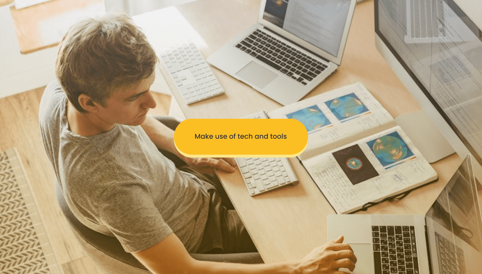 A person working with multiple laptops.