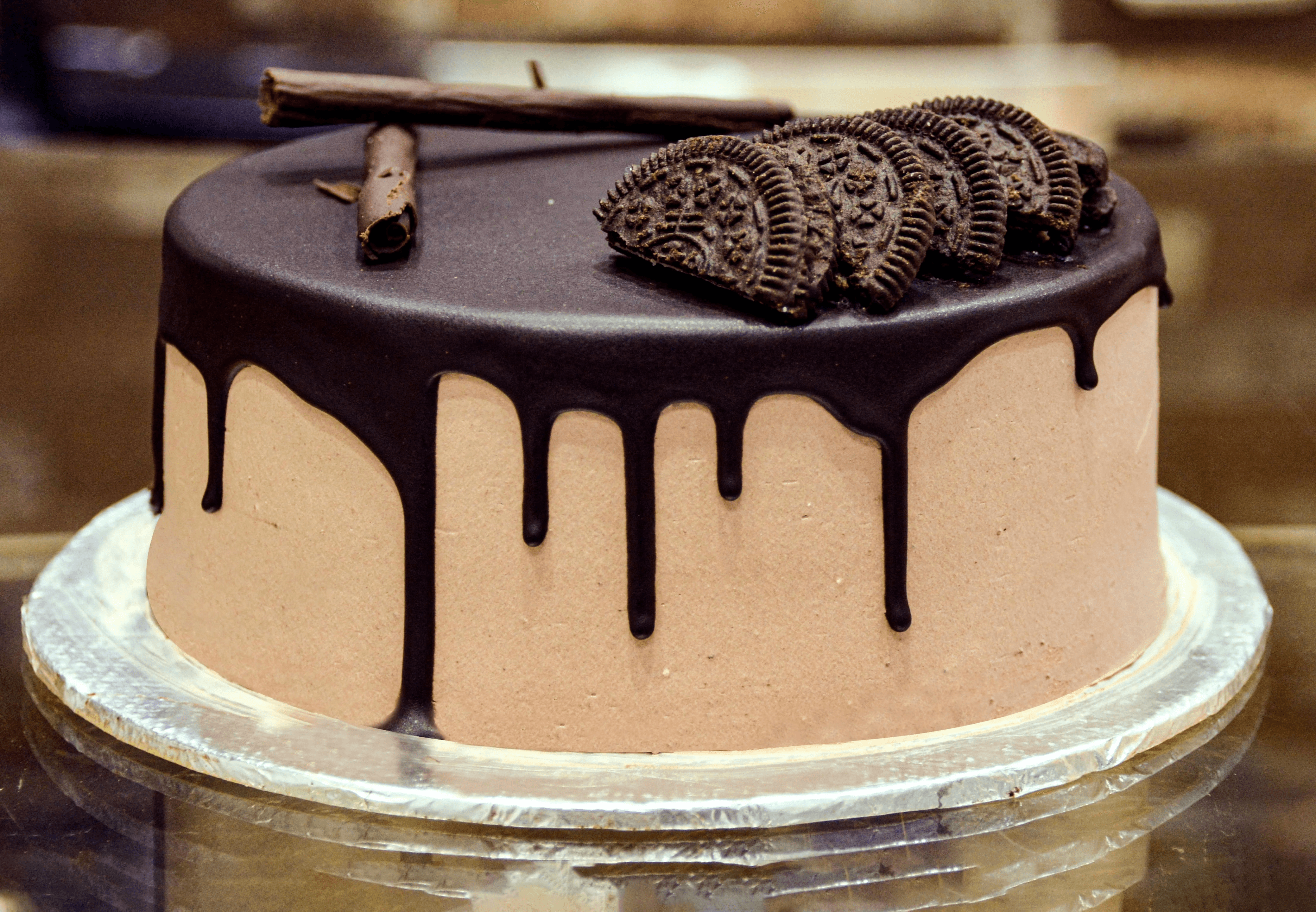 chocolate cake with chocolate syrup on top