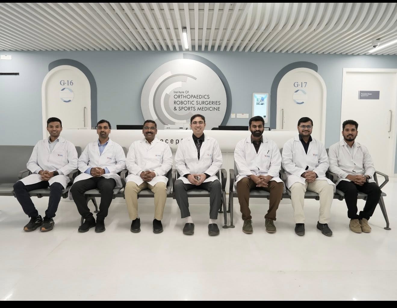 A large gold futuristic tank on a rooftop overlooking a skyscraper city