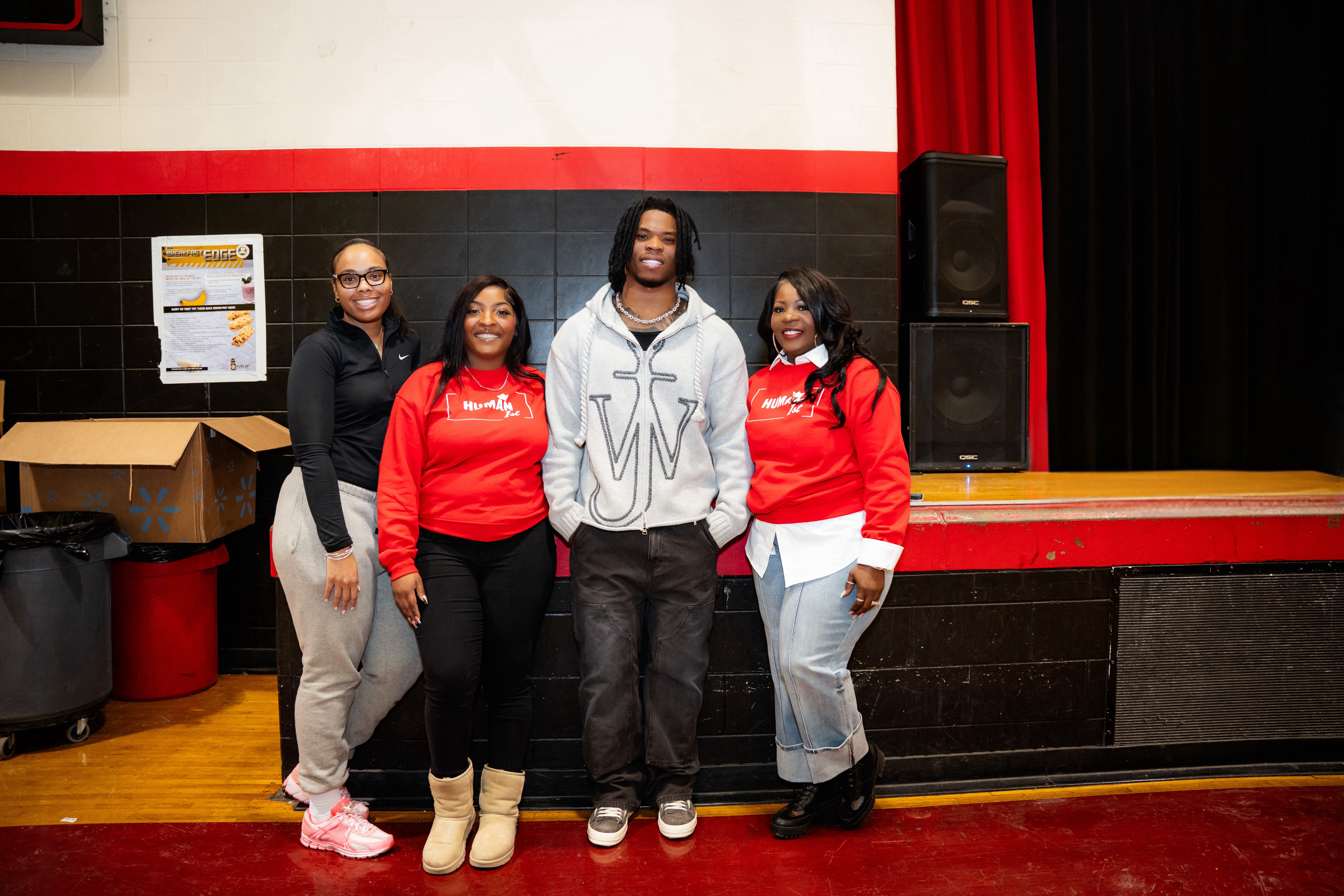 a black and white living room with a large tv