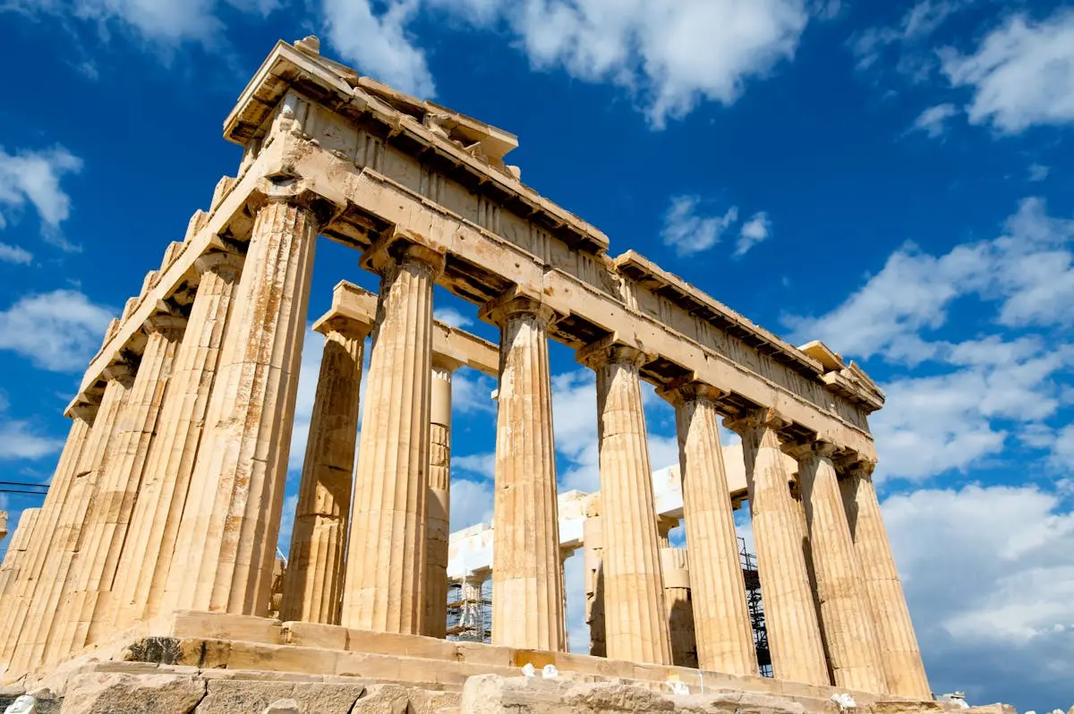 a photo of ancient columns that once surrounded a building
