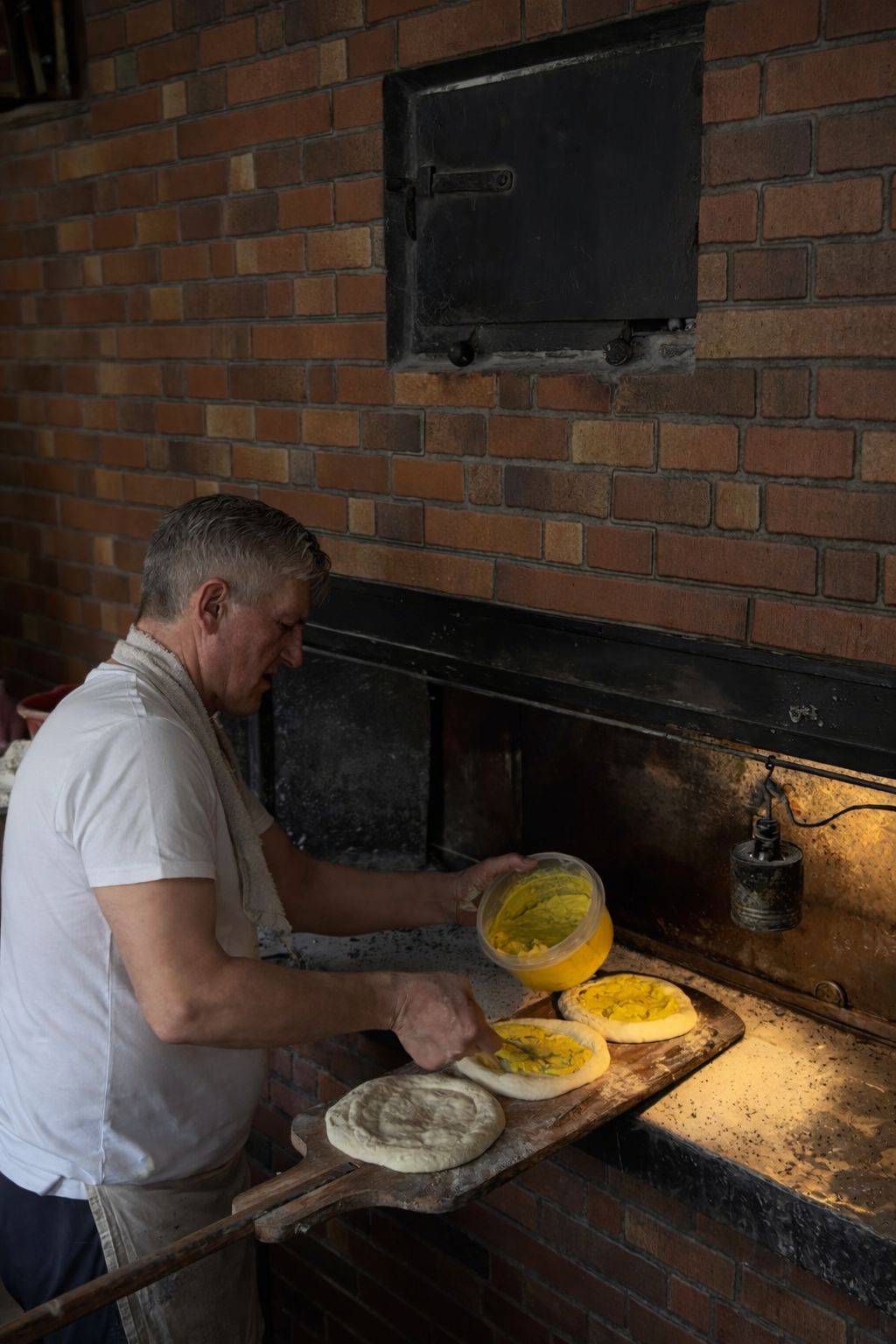 A laptop, tablet and mobile on a table