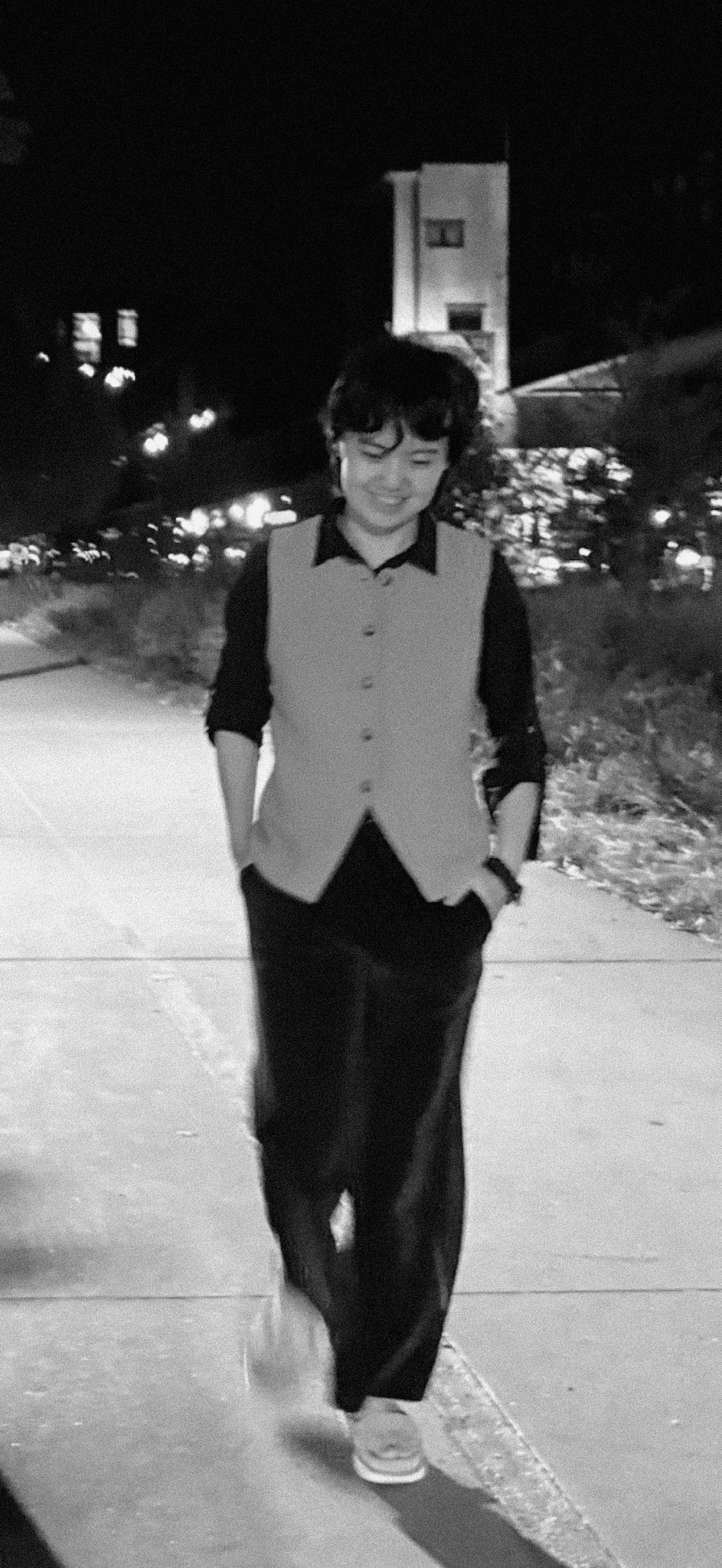 J Wang casually walking on the streets  of Atlanta at night