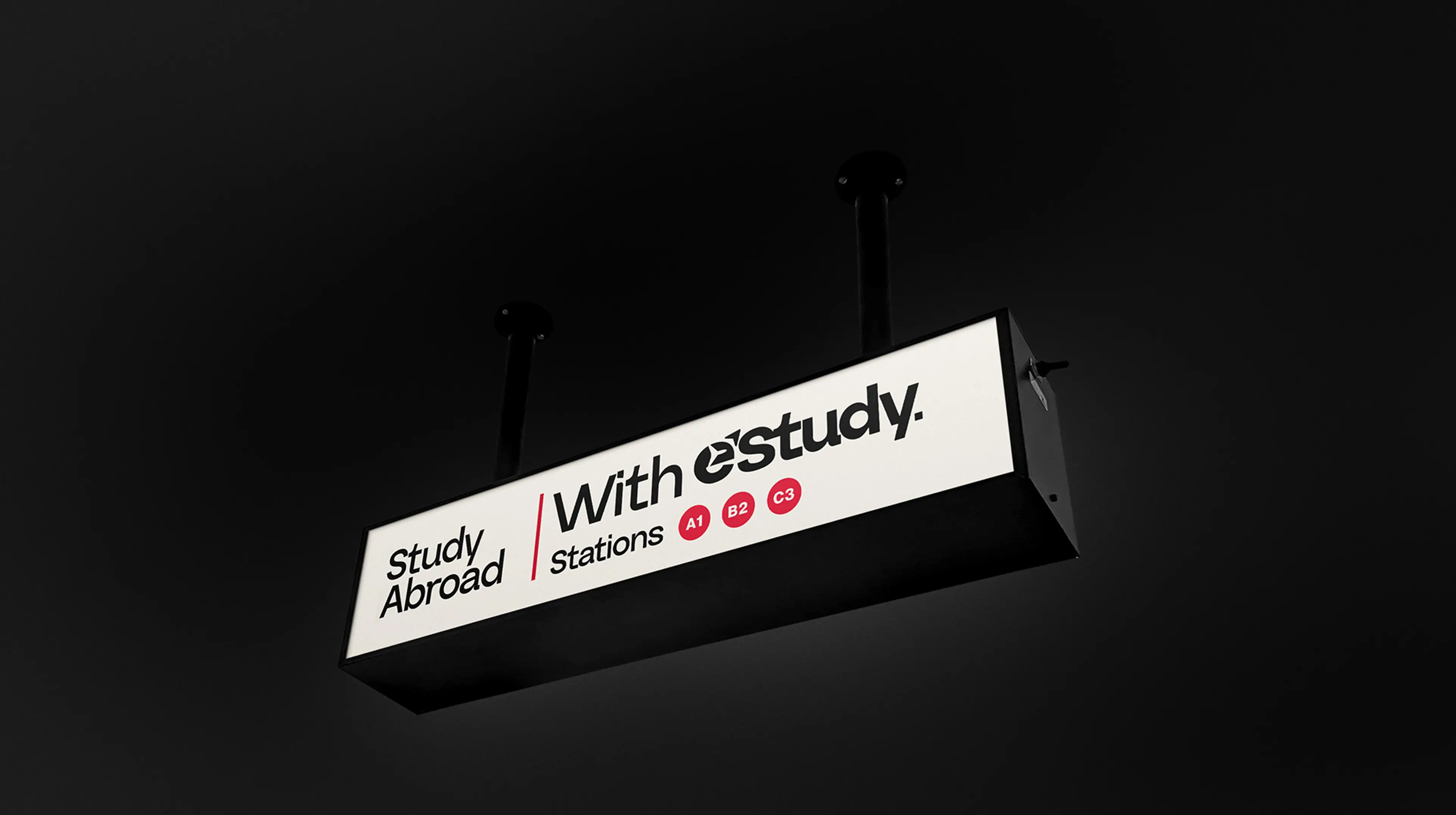 Estudy branded lightbox sign mockup reading Study Abroad with eStudy Stations featuring social media icons