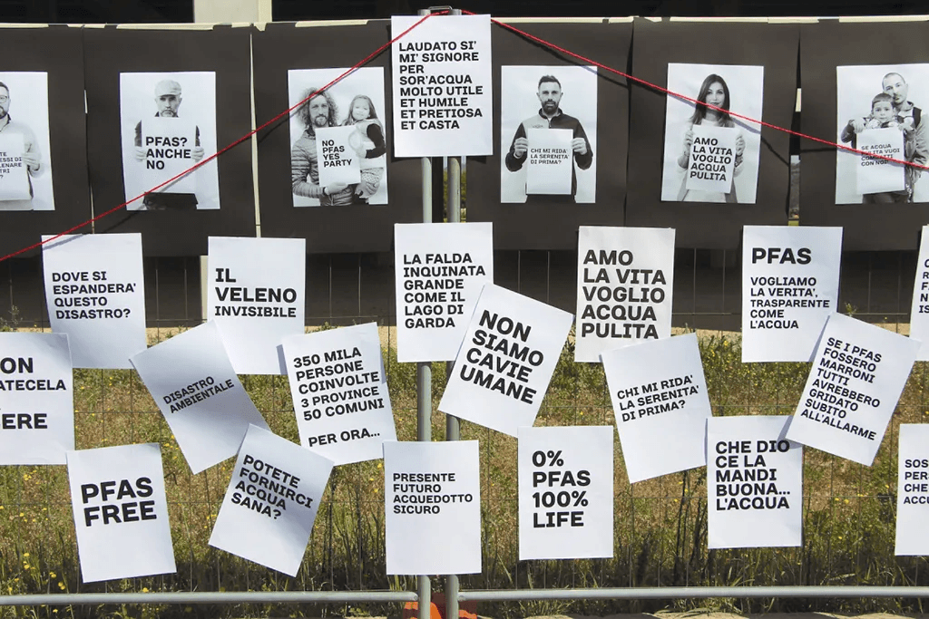 a person stacking coins on top of a table