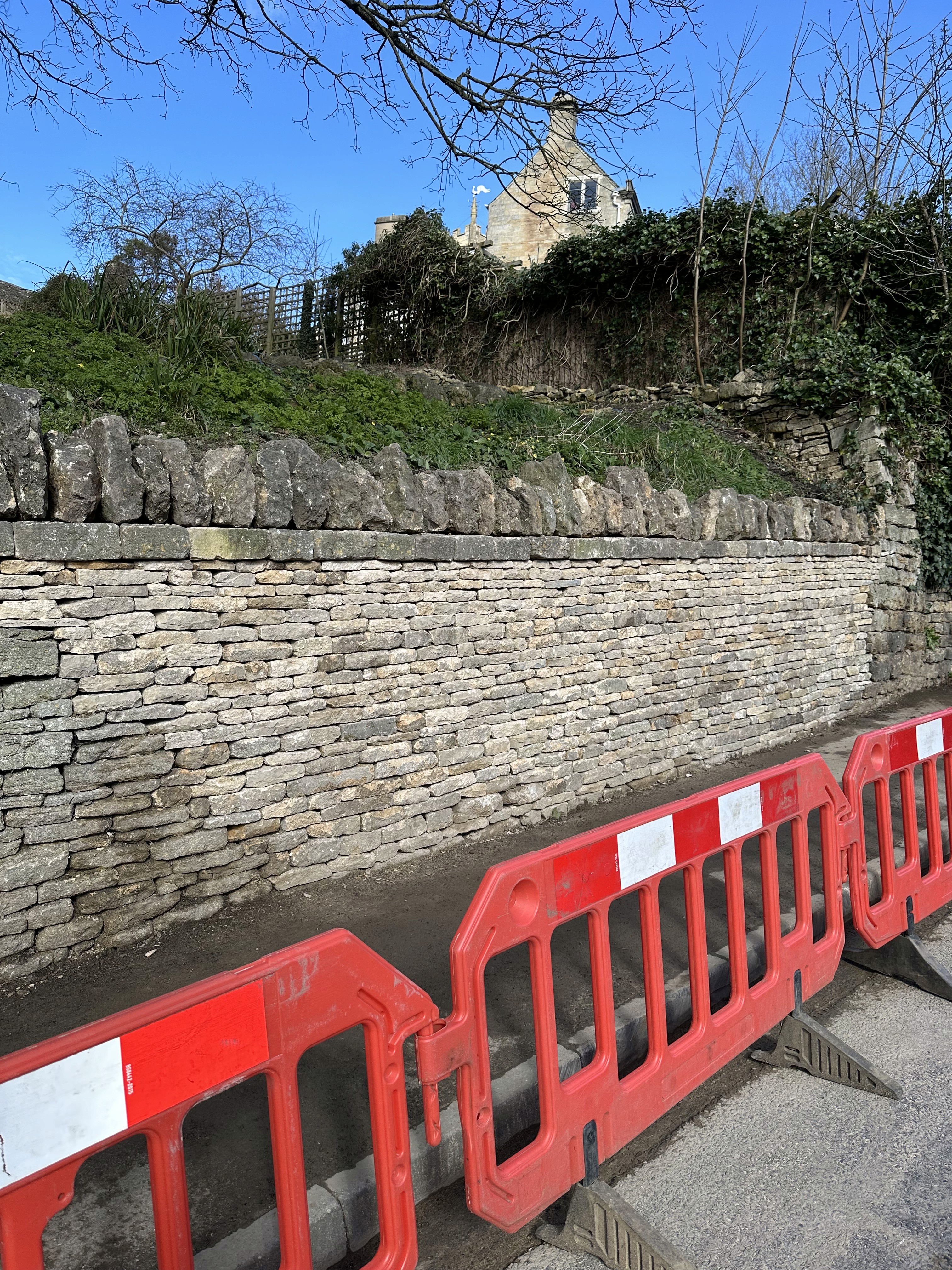 chisel near hammer on wooden board