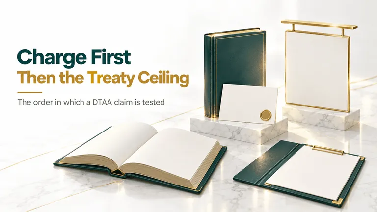 A teal statute book, a gold-edged treaty booklet and a blank certificate folder on a marble desk