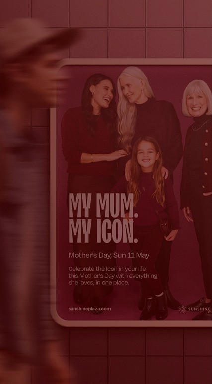 A fast black sports car races down the highway.