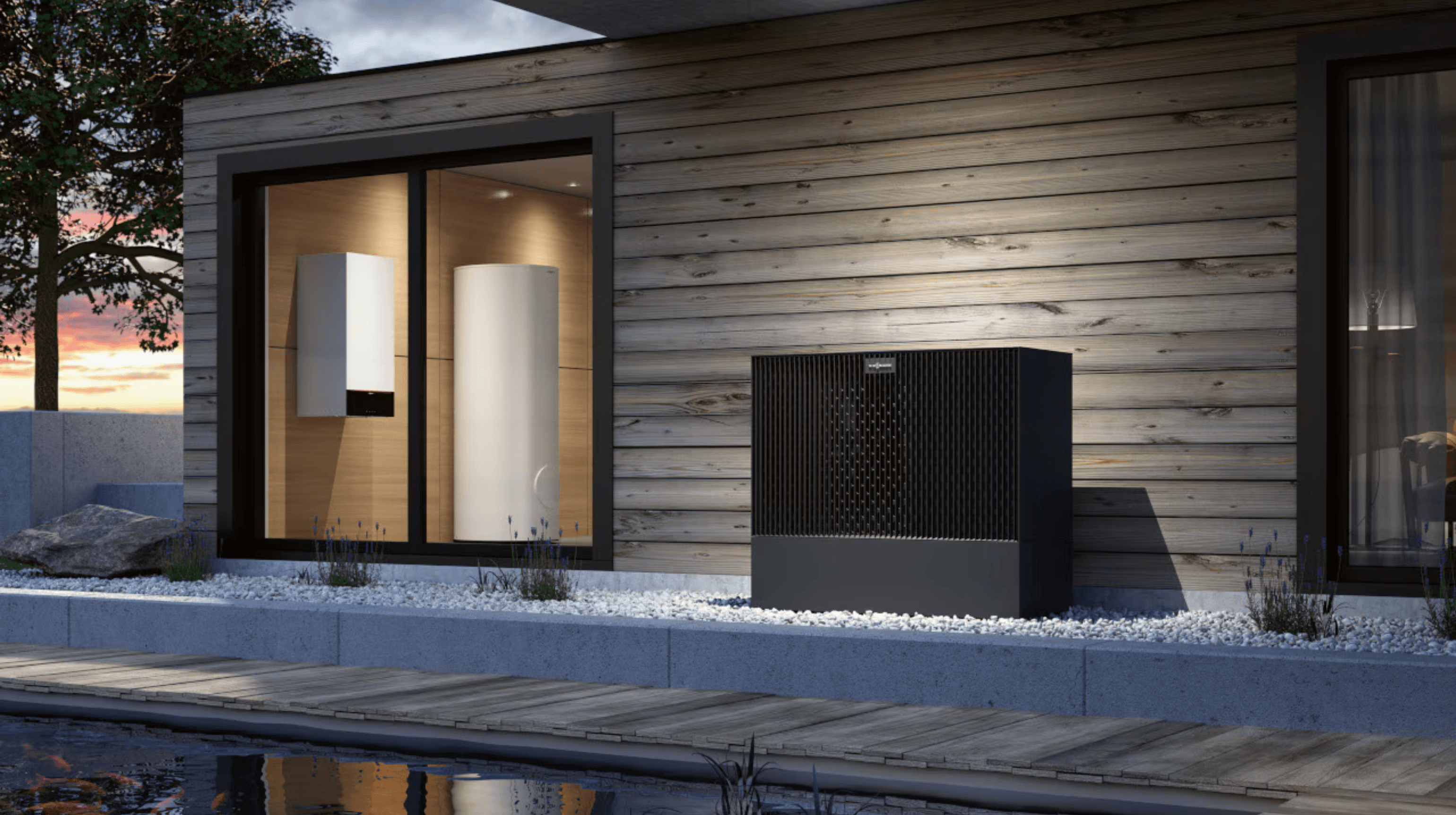 Moderne Luft-Wasser-Wärmepumpe mit Inneneinheit und integriertem Warmwasserspeicher im Einfamilienhaus – effiziente Heizlösung mit Buderus Wärmepumpensystem für nachhaltiges Heizen.