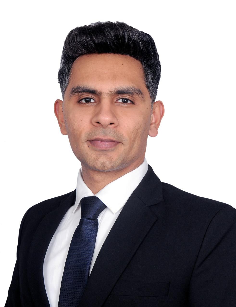 man standing beside wall