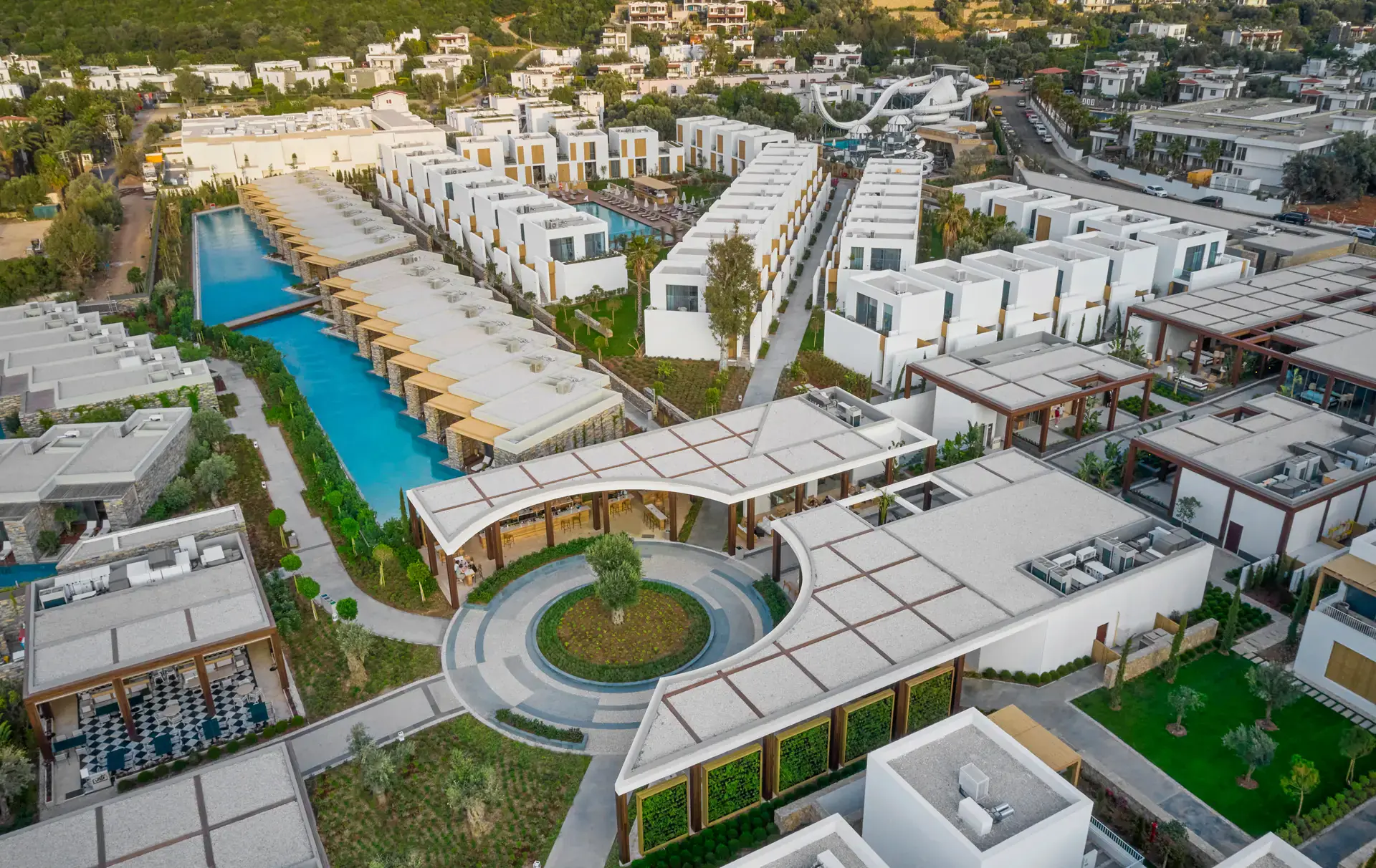 Aerial view of the circular courtyard, pools and buildings