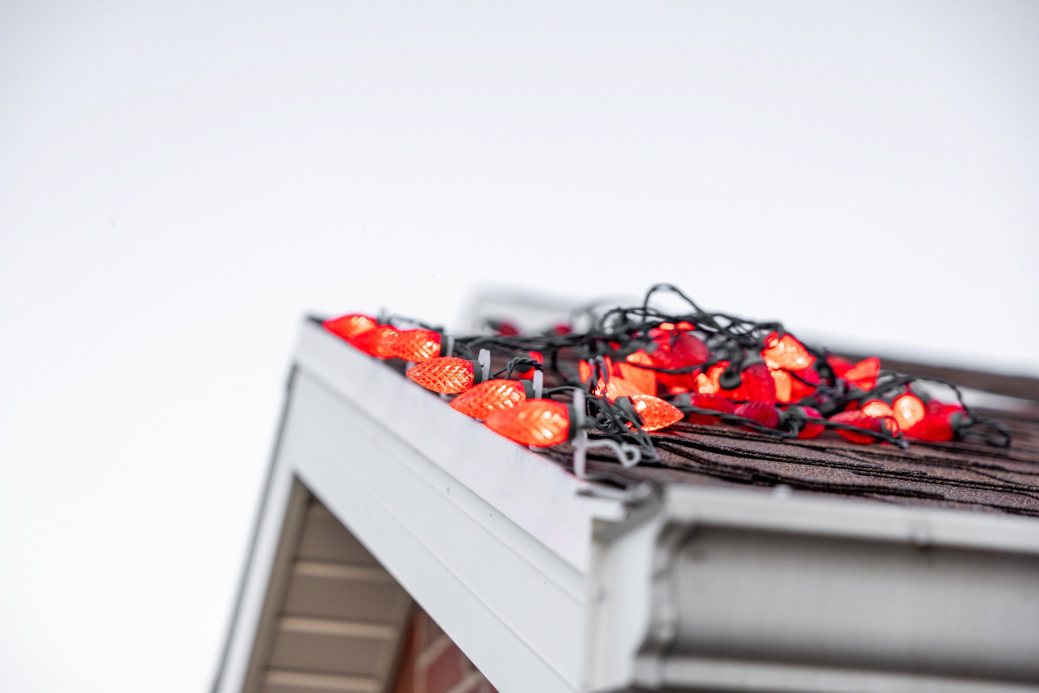 Installing outdoor holiday lighting in Northern Utah