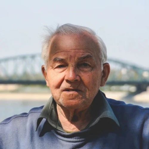 Senior man standing outdoors, representing adult pain-free circumcision options in Coburg and Melbourne's inner north.