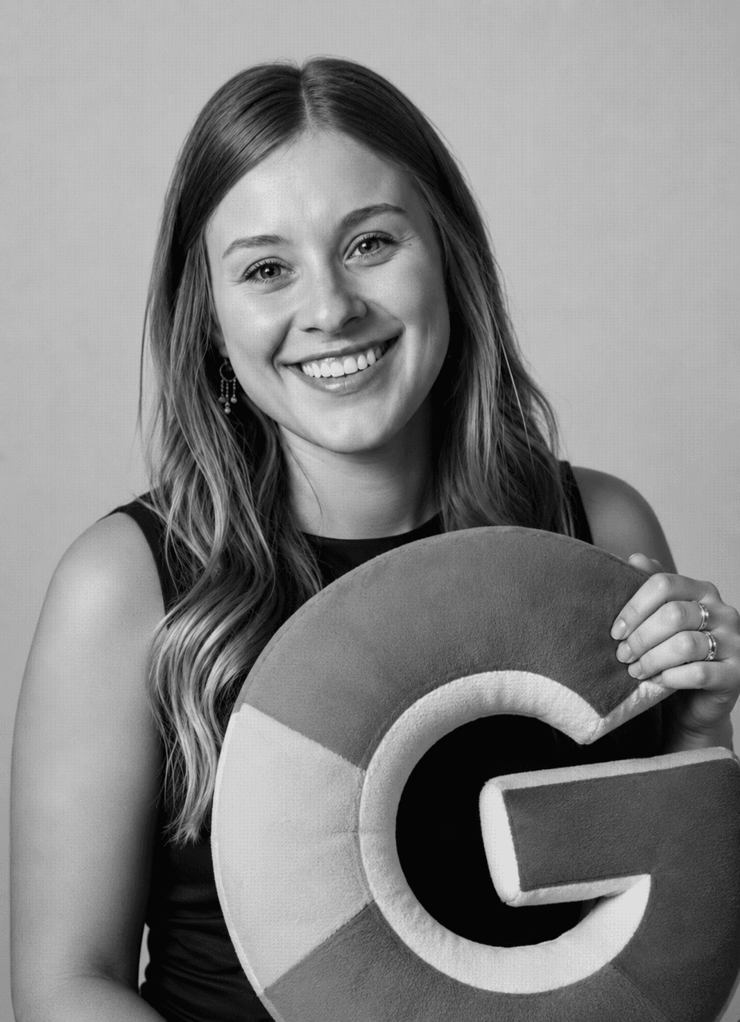 Person holding a pillow