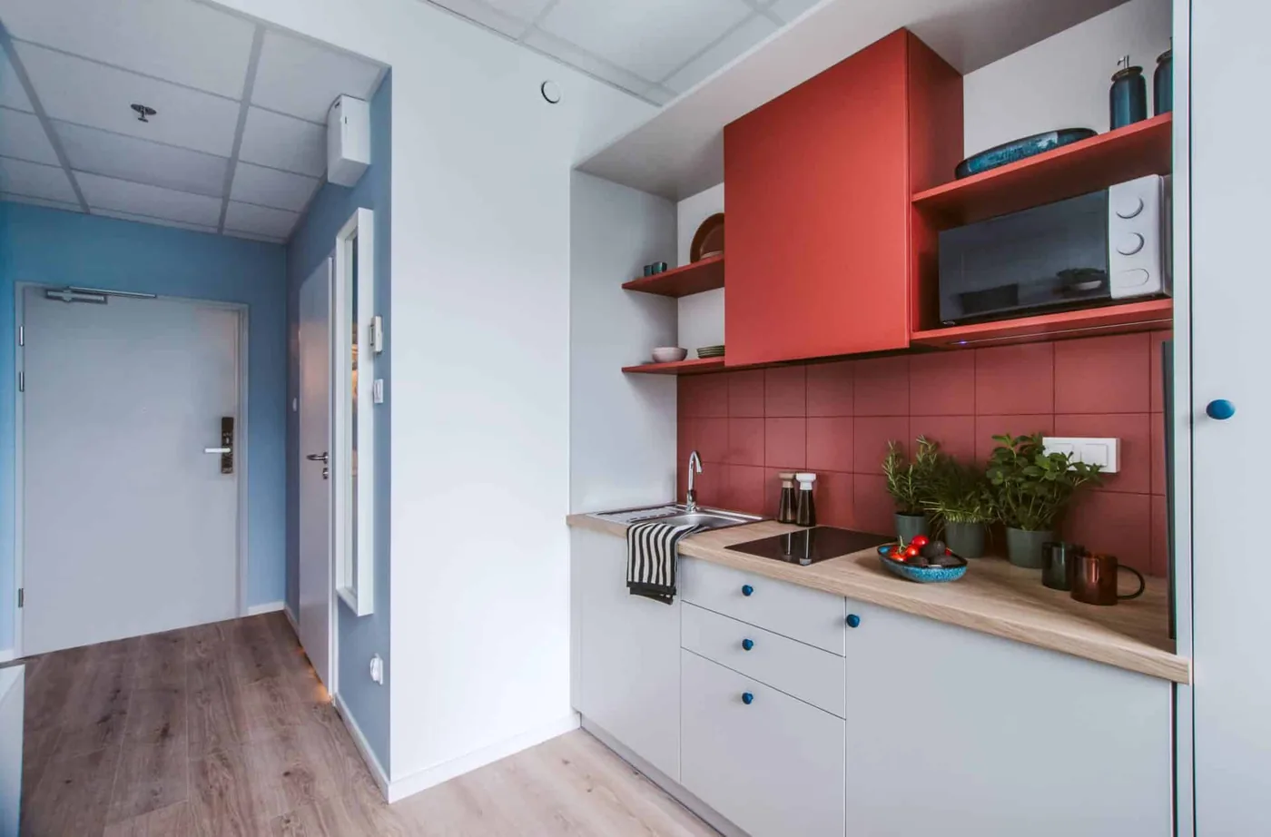 Private kitchenette inside modern student studio accommodation in Warsaw