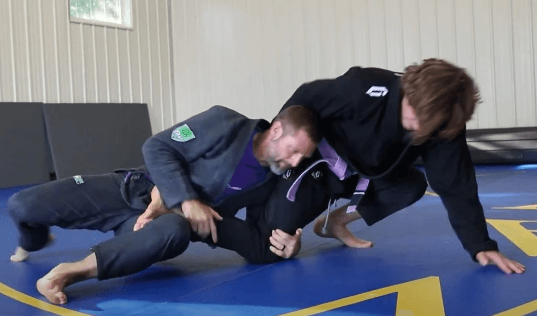 Half guard wrestle up