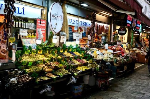 A market stall of spices and dried goods
