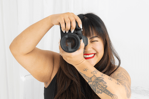 Professional photographer posing during her photoshoot for her new portfolio