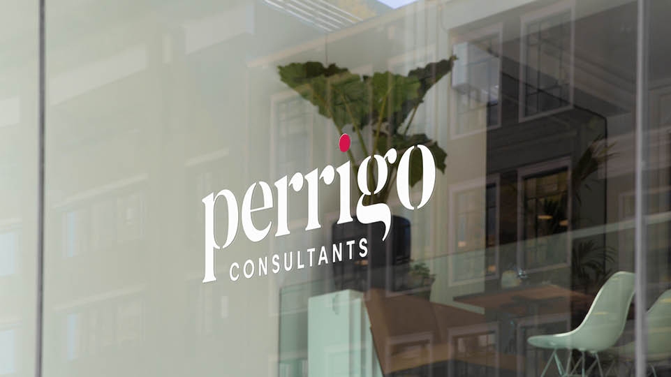 a pair of cell phones on a concrete block