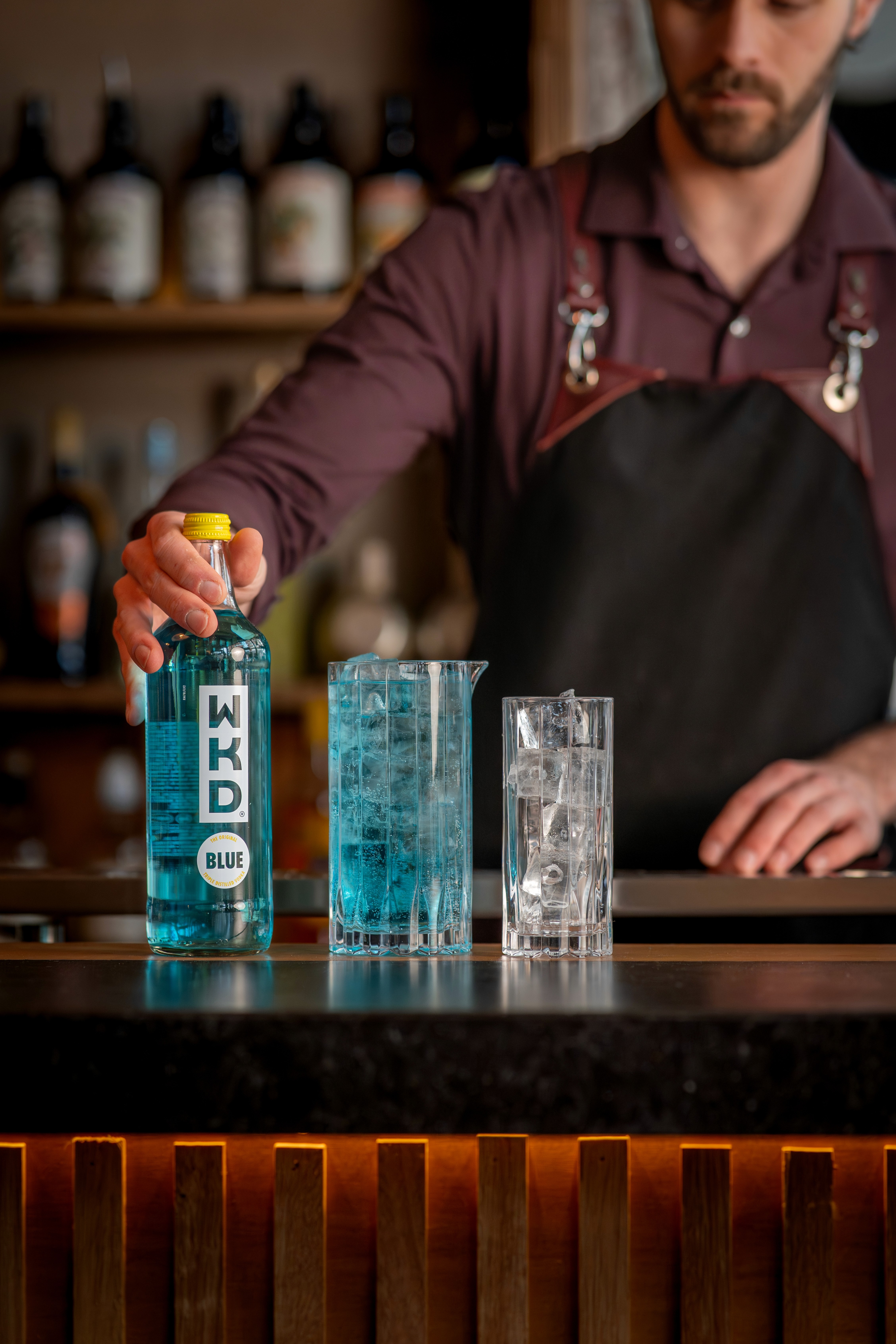 a blurry photo of a person standing in front of a wall