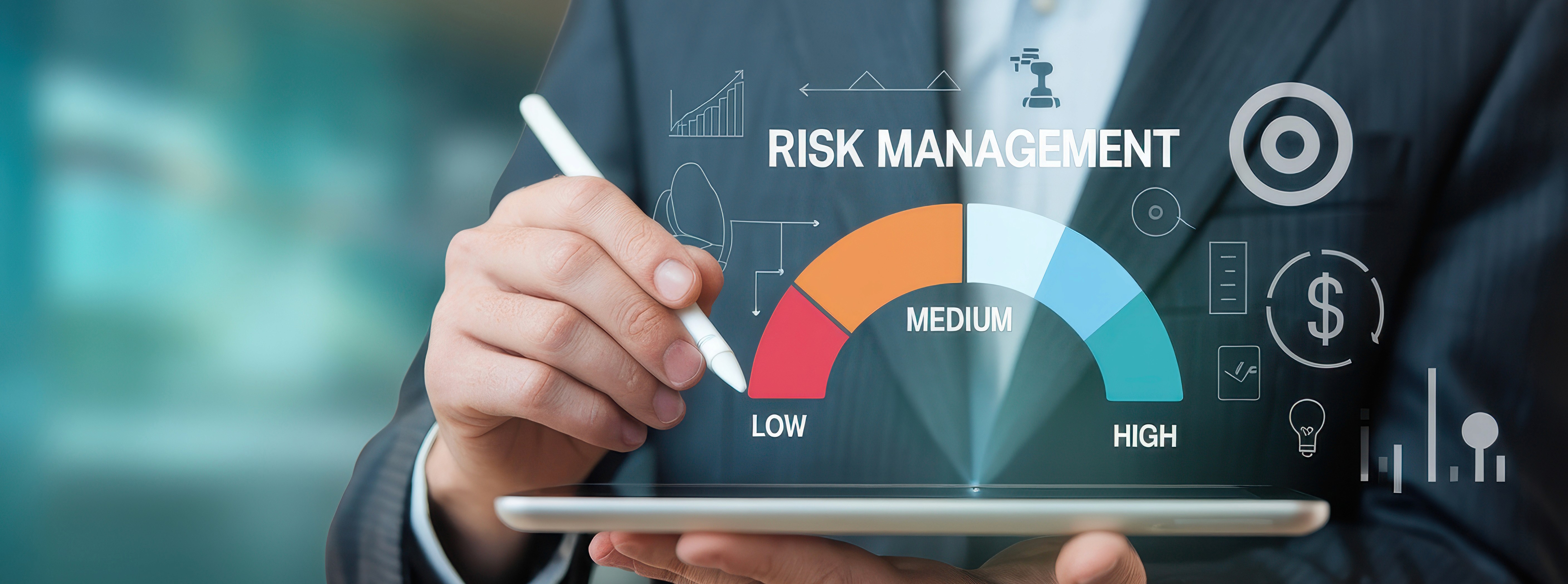 a group of people sitting around a table with laptops