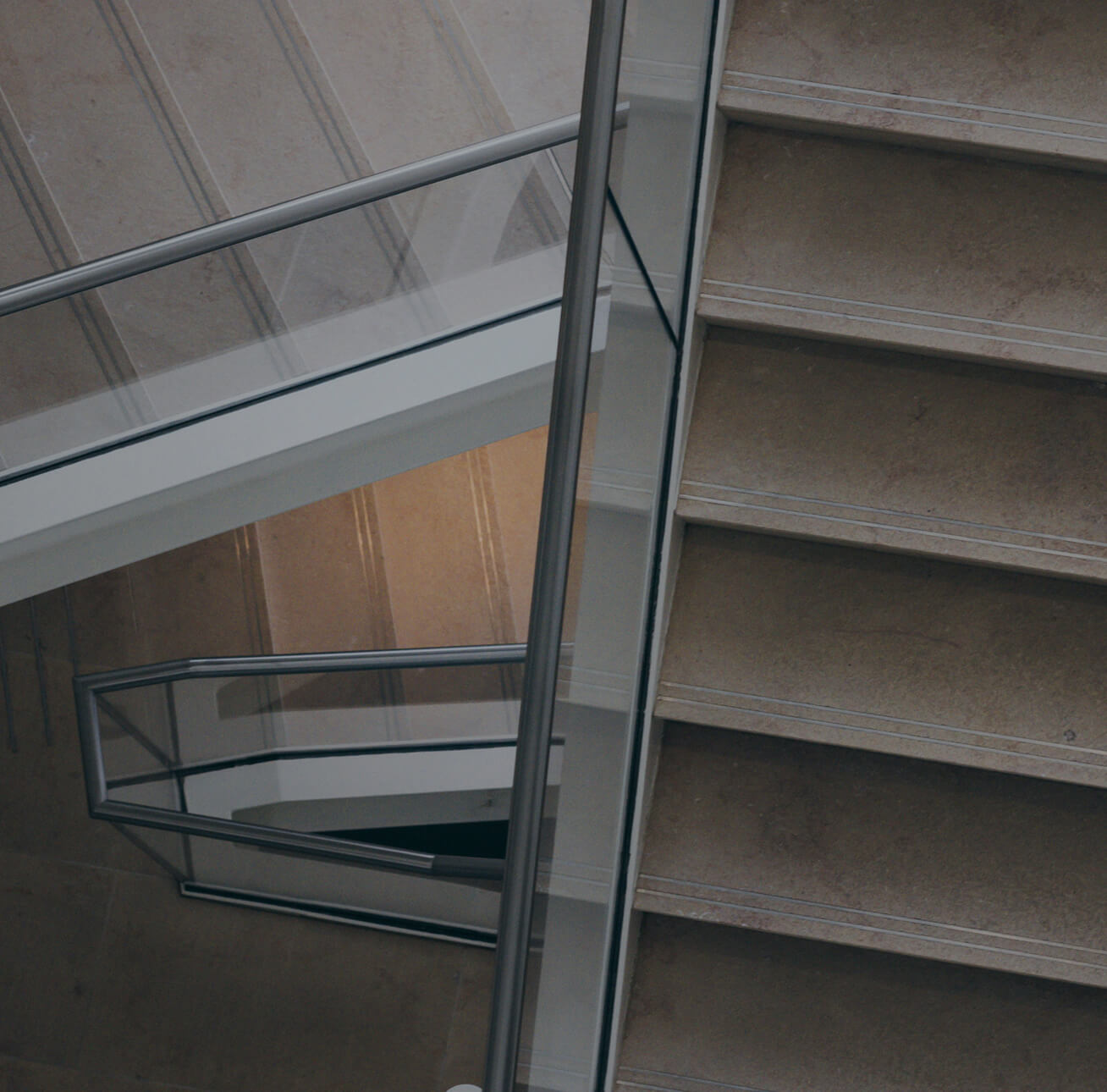 An aerial view of staircases inside an office building