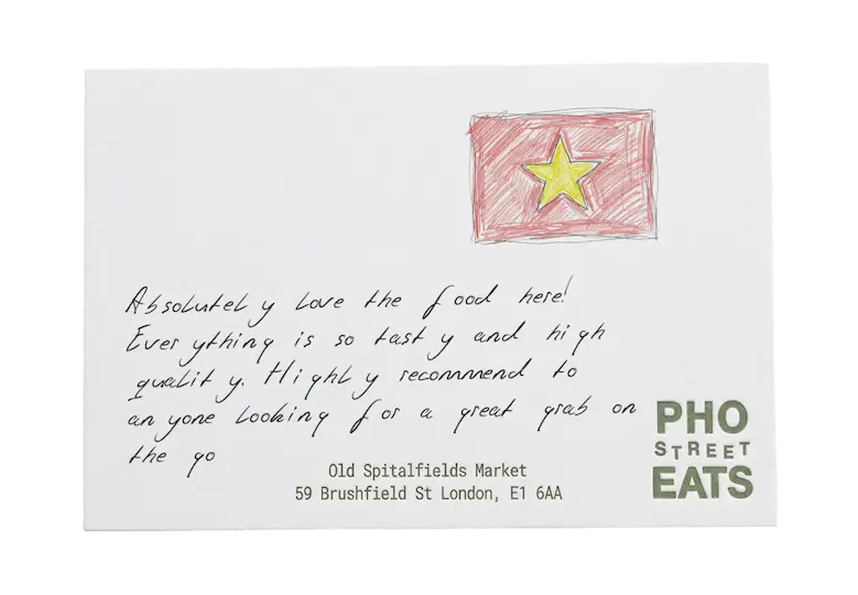 Pho Street Eats review card with the Vietnamese flag, recommending the food.