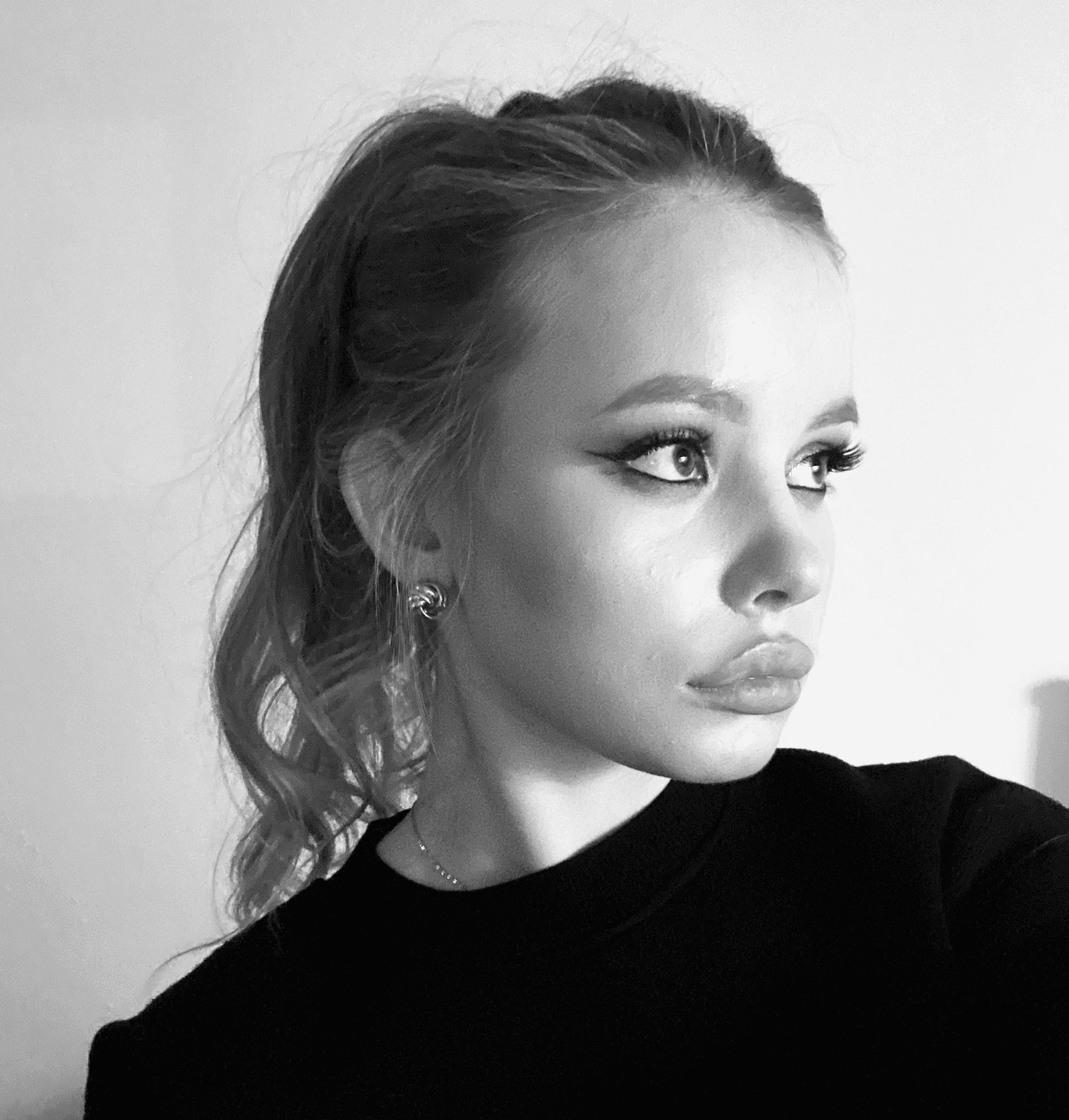 Headshot of *Designer Name*