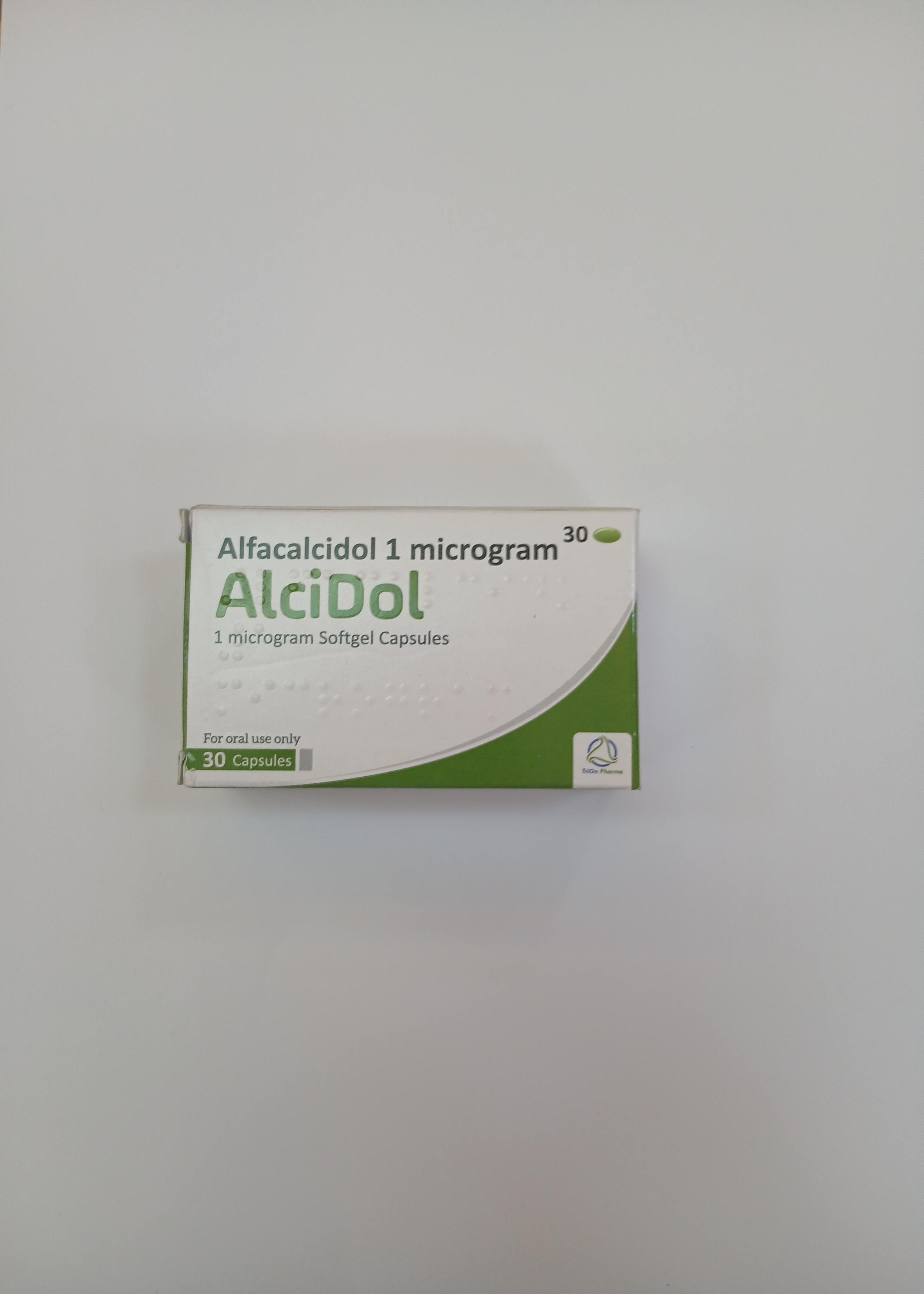 AlciDol Alfacalcidol 1 microgram softgel capsules, 30 capsules in a white and green cardboard box.