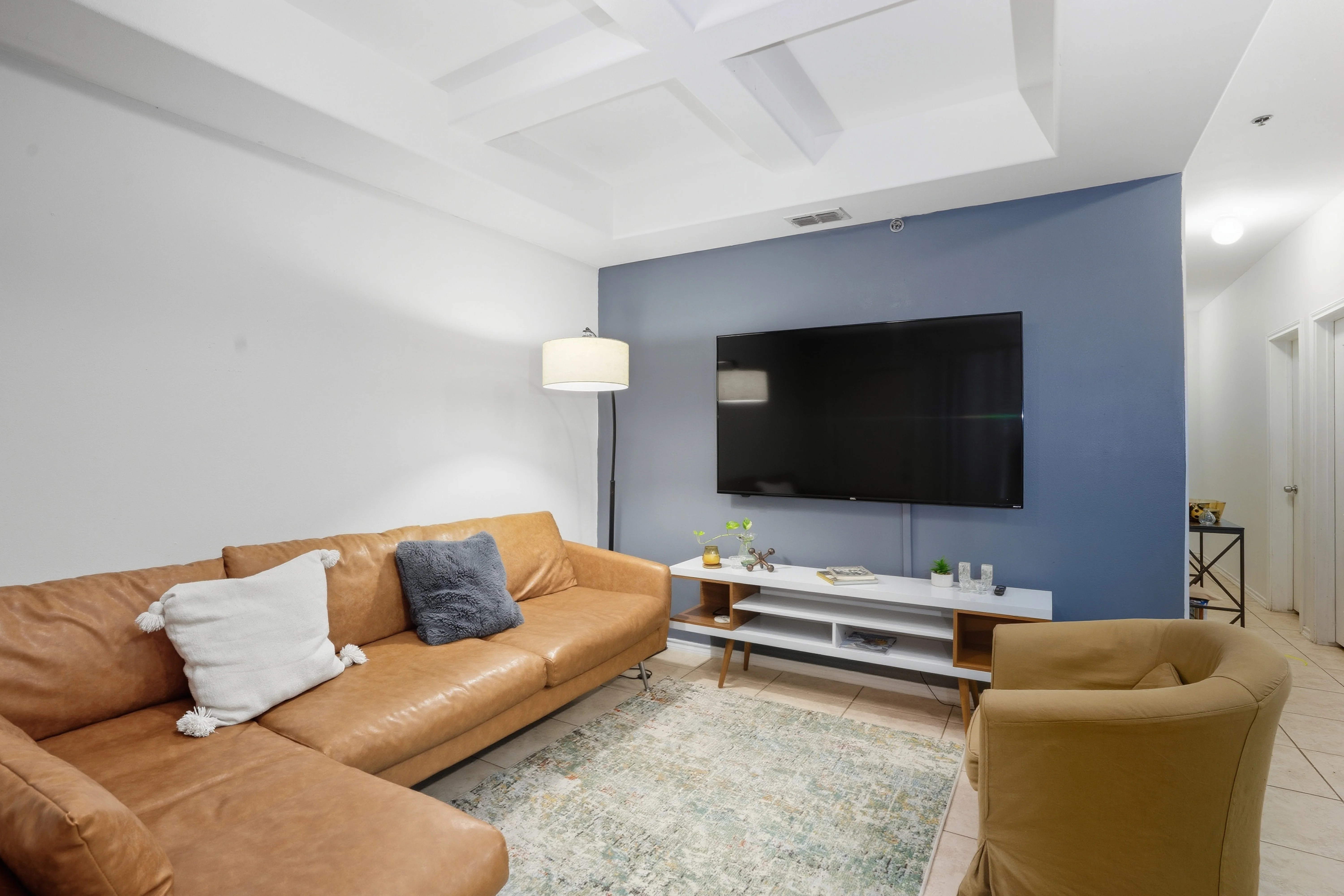 A picture of a house during twilight.