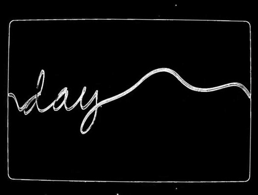 A black screen with the white handwritten text: day.