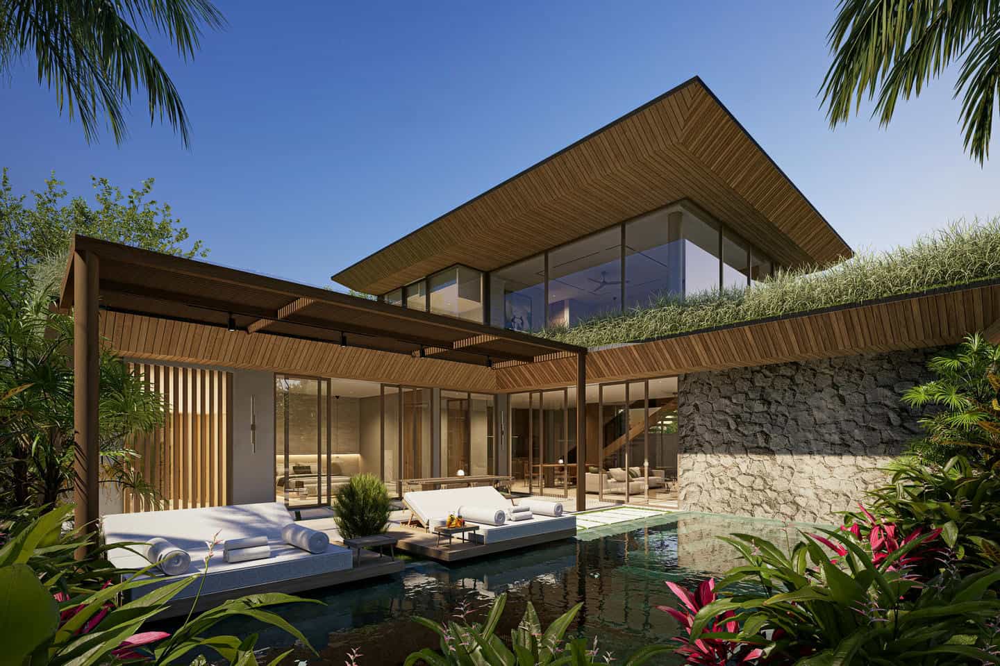 Luxury Uluwatu property featuring contemporary architecture and tropical poolside lounging areas.