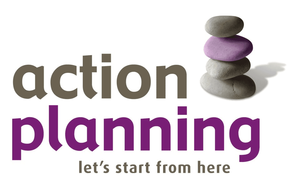 A person with a purple robe and green eyes standing on the side of an advertisement.