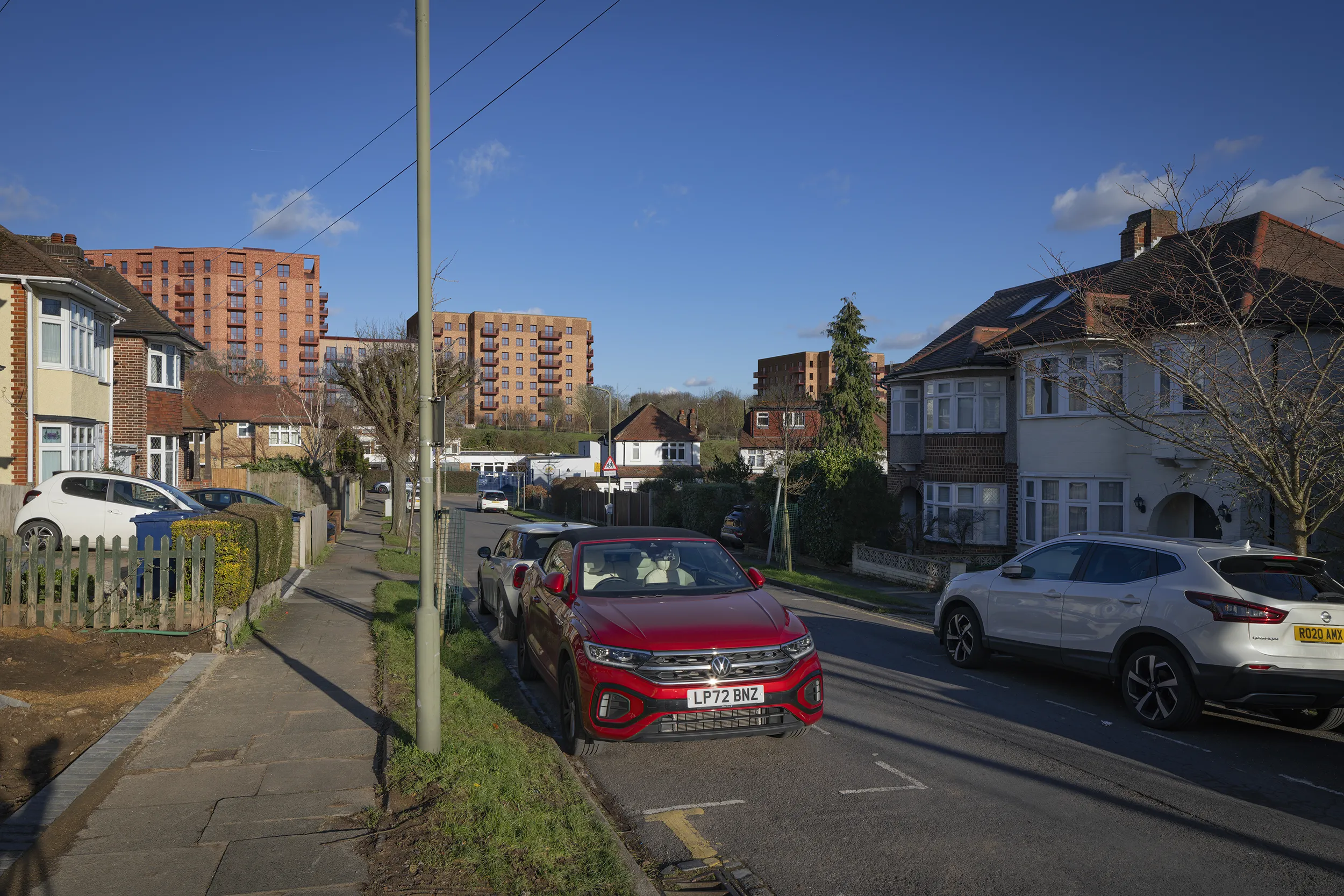 Winter Type 4 AVR Level 3 verified view north east along Elton Avenue, High Barnet, with Buildings A and B partly visible above a suburban roofscape of two storey houses. Produced by Eye-kon.