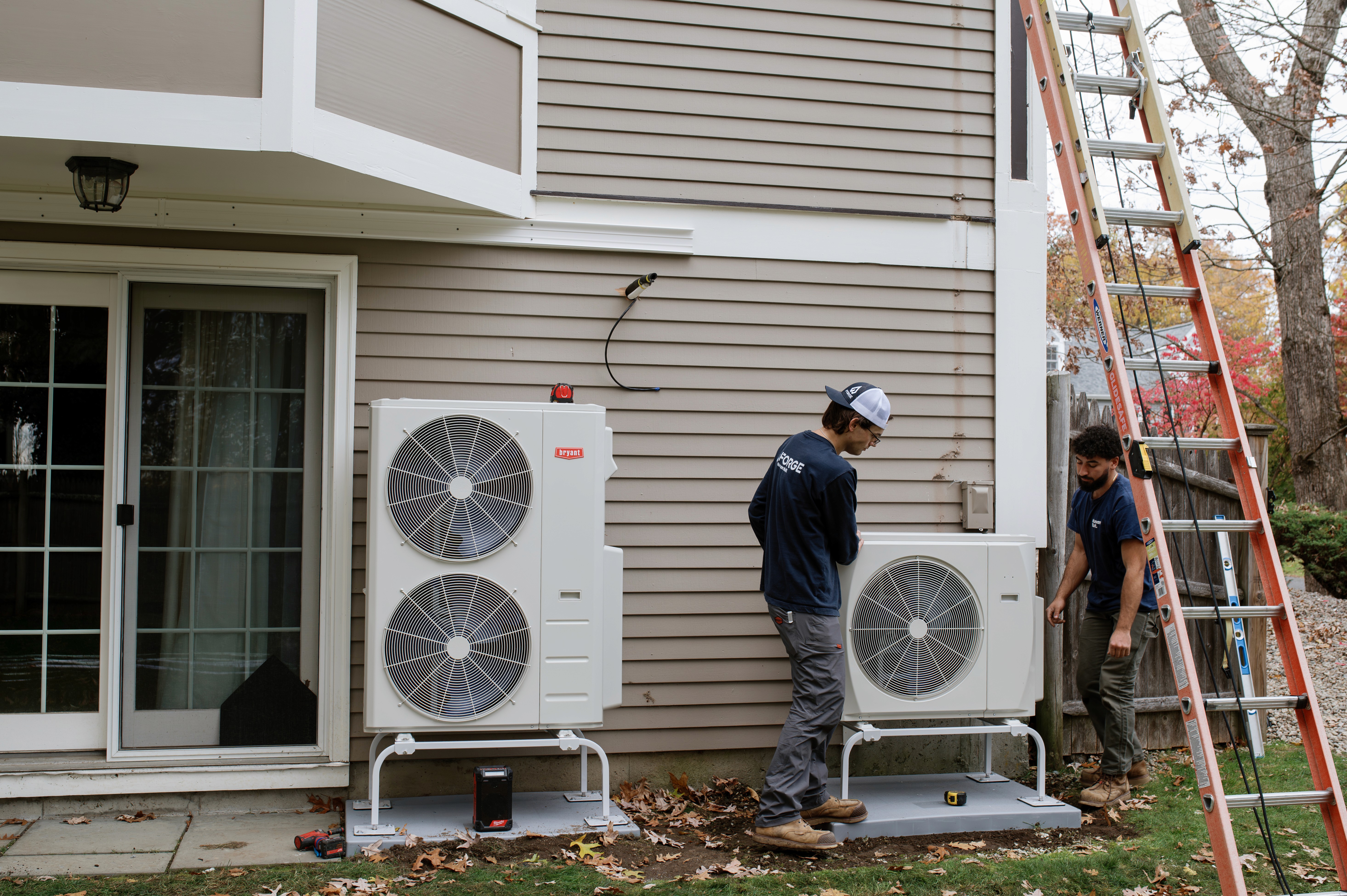 Forge heat pump team at an installation