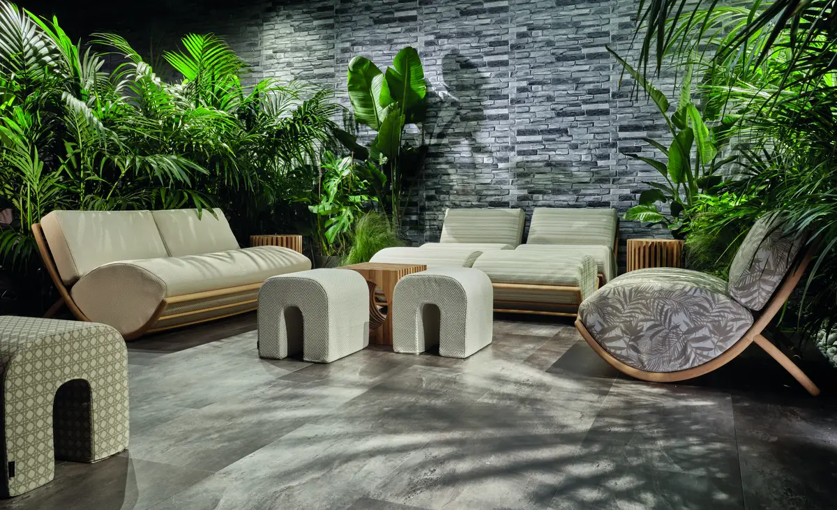 Artisan-crafted Italian outdoor furniture with luxurious materials and natural elegance, showcased at Salone del Mobile 2025 in Milan.