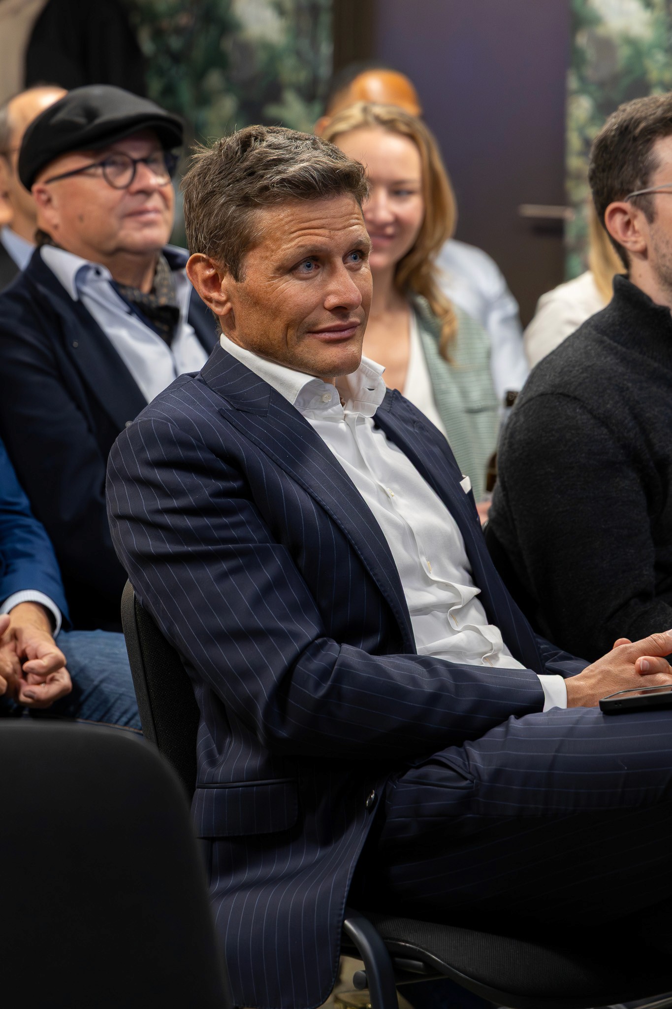 Investor attending the CV Summit conference in Zug photographed by Mizuri.