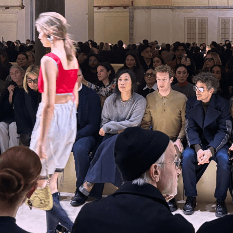 A person walking down the catwalk in a crowd of people

AI-generated content may be incorrect.
