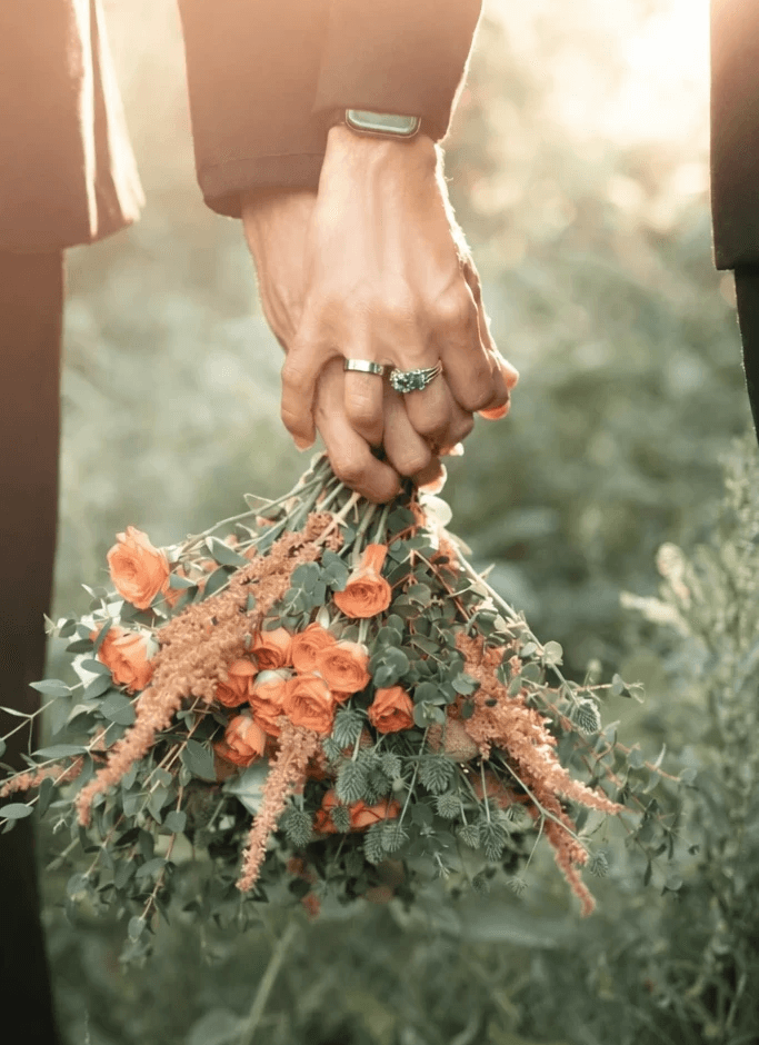 Photo by Alexander Mass: https://www.pexels.com/photo/close-up-of-couple-holding-hands-with-rings-29484004/