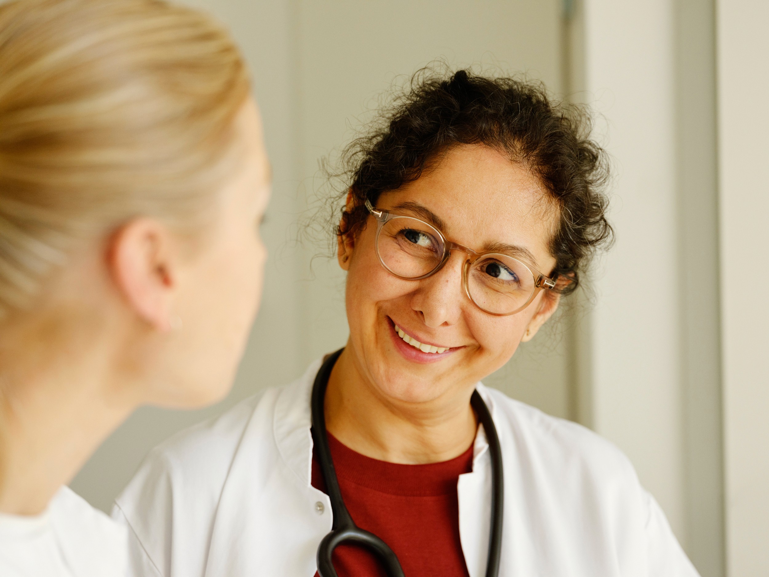 Doctor smiling at nurse