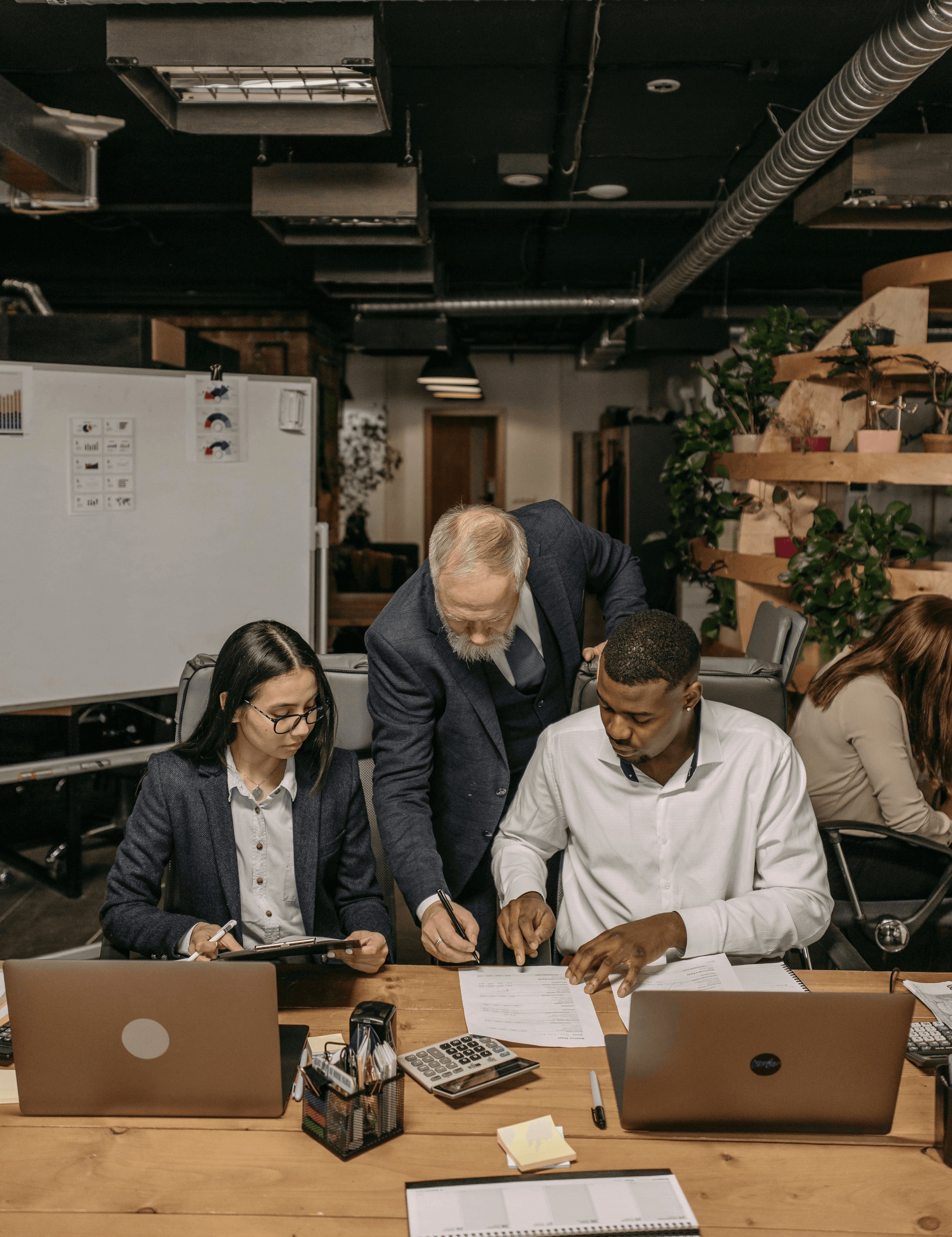 Photo by Pavel Danilyuk: https://www.pexels.com/photo/four-people-working-in-the-office-7654176/