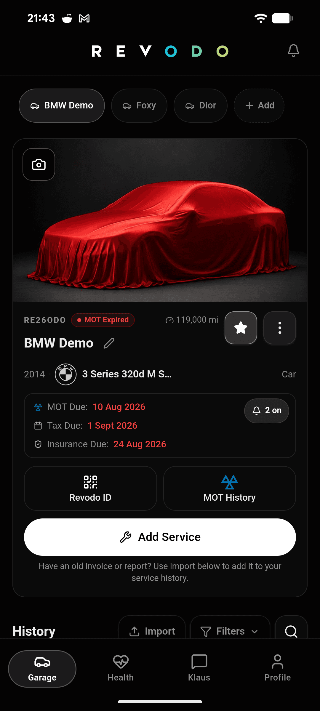 Revodo Garage on Android showing overdue MOT, tax and insurance dates in red