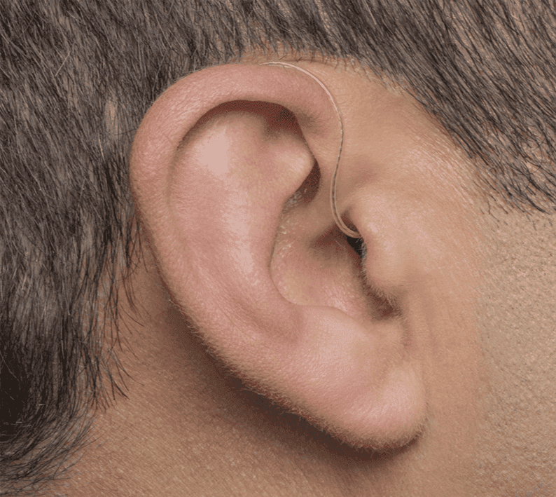 Doctor checking a male patient's hearing
