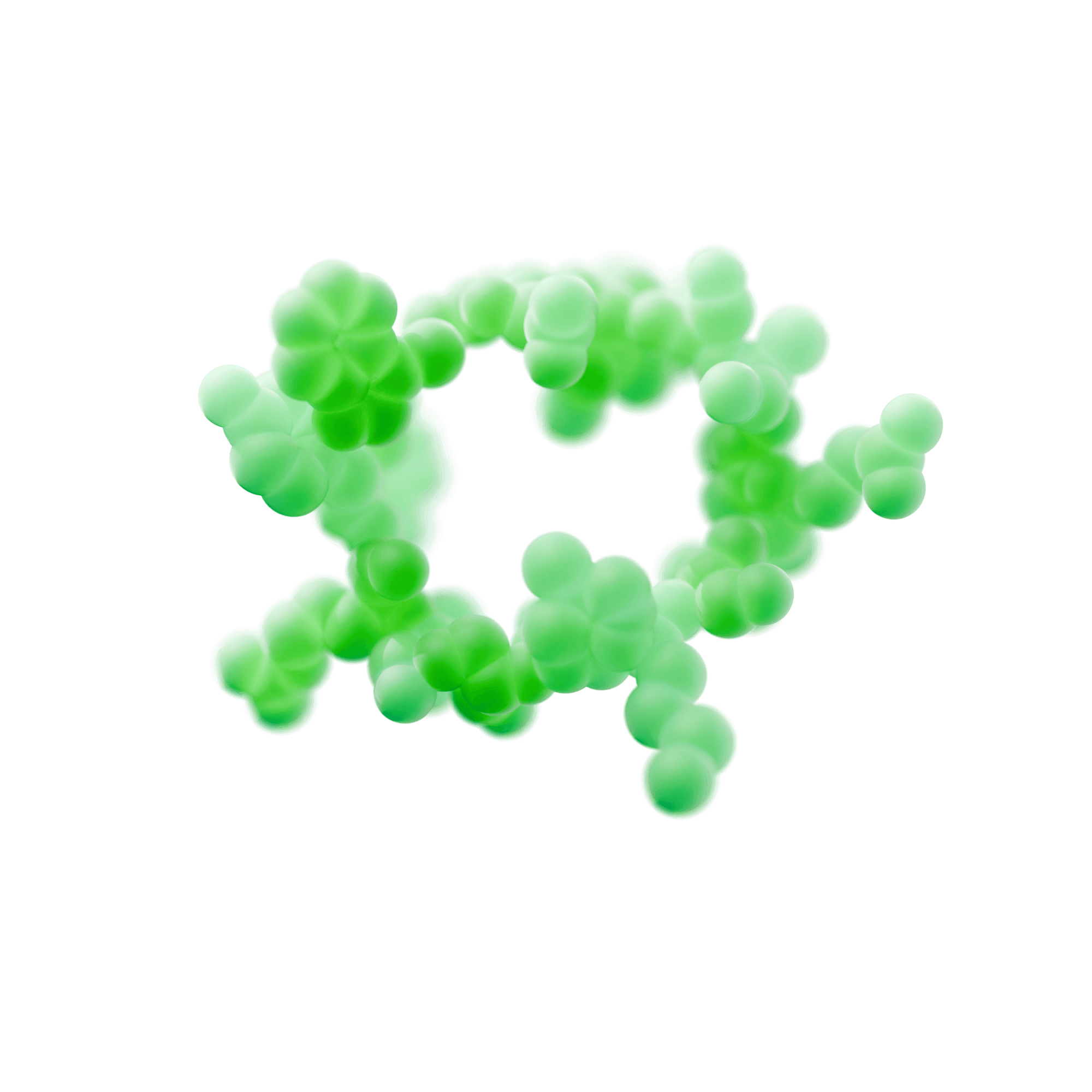 A young person with curly hair smiles at the camera while sitting in front of a laptop against a dark background.