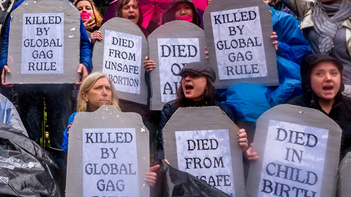 A coalition of physicians, AIDS activists, medical students, and women’s health and rights advocates protest against Trump’s “global gag rule