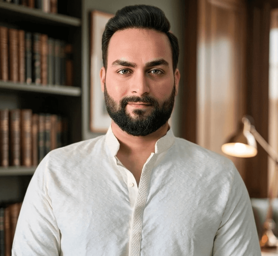 Image of astrologer Jugraj Gill wearing white Kurta - portrait shot